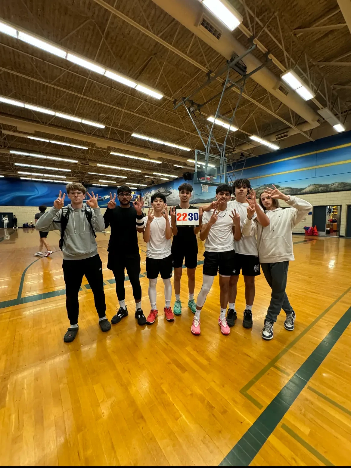Ethan playing basketball with friends