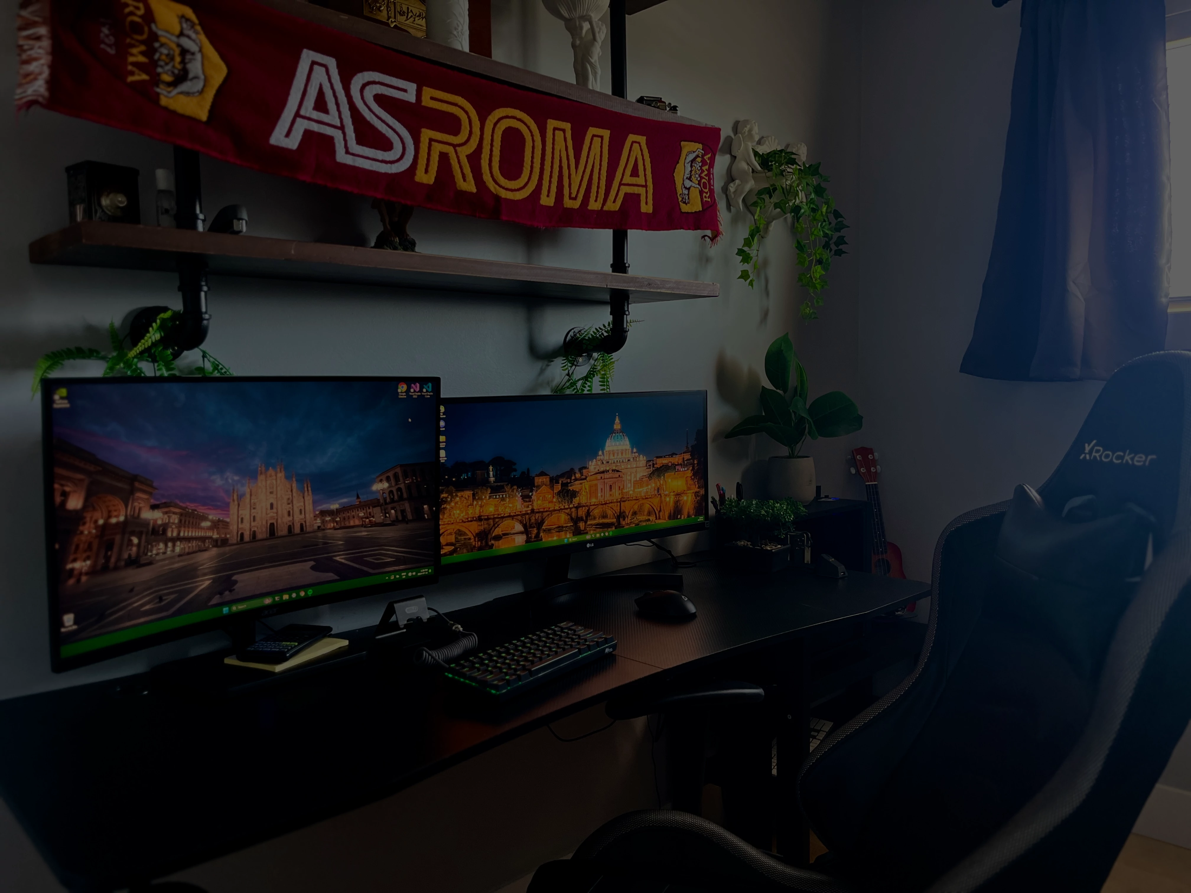 Ethan Breitkreutz office and desk setup with a plant and a computer with 2 monitors